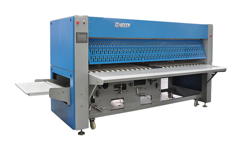 我司水洗廠設(shè)備中的折疊機 我司水洗廠設(shè)備中的折疊機